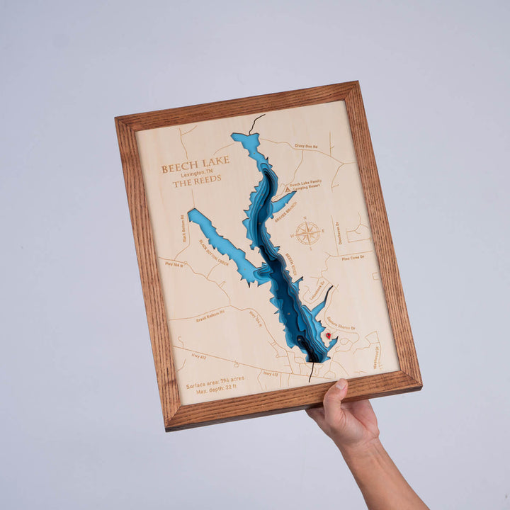 Hand holding a 3D Wooden Beech Lake Map, perfect for home decor by Moc Tho