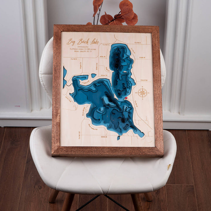 Custom 3D Wooden Map of Big Birch Lake, displayed on a chair, showcasing craftsmanship by Moc Tho