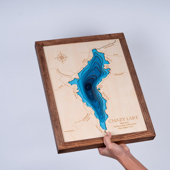 Experience the intricate details of the Chazy Lake 3D wooden map, held in hand, meticulously crafted by Moc Tho