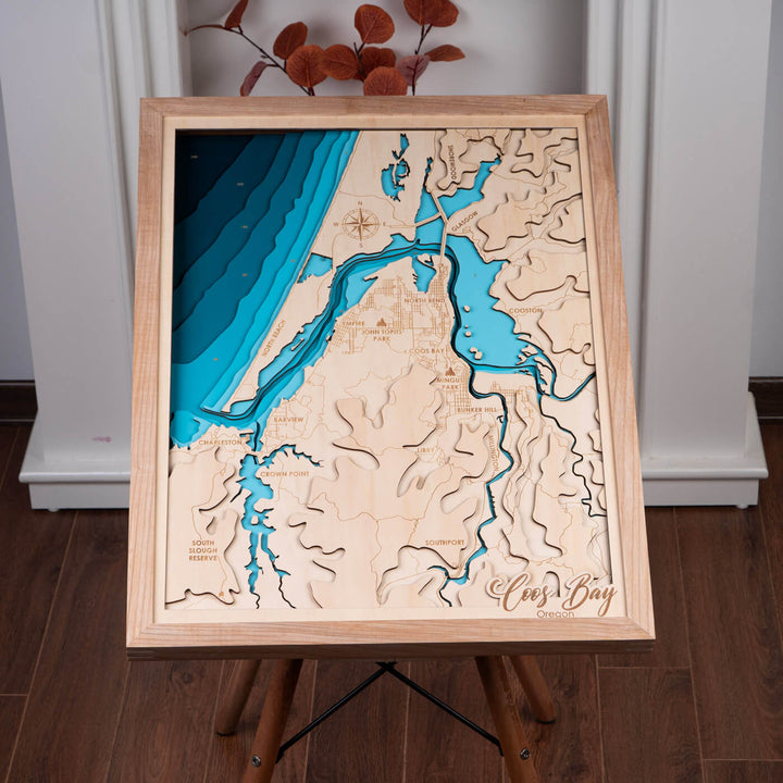 Immerse in the topographic beauty of the Coos Bay 3D wooden map, a testament to Moc Tho’s exquisite craftsmanship