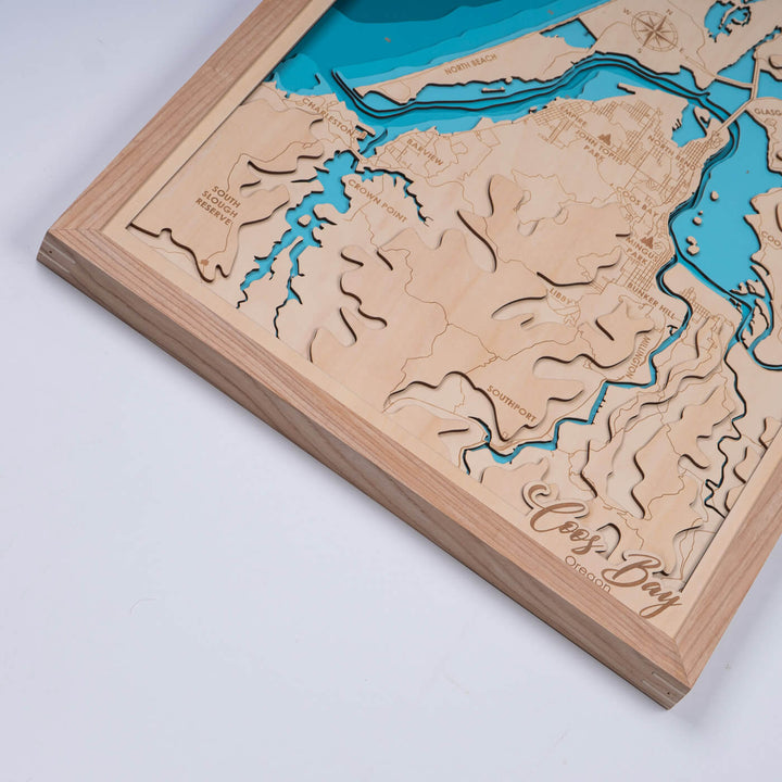 Experience the intricate topography of the Coos Bay 3D wooden map, a unique piece of decor by Moc Tho