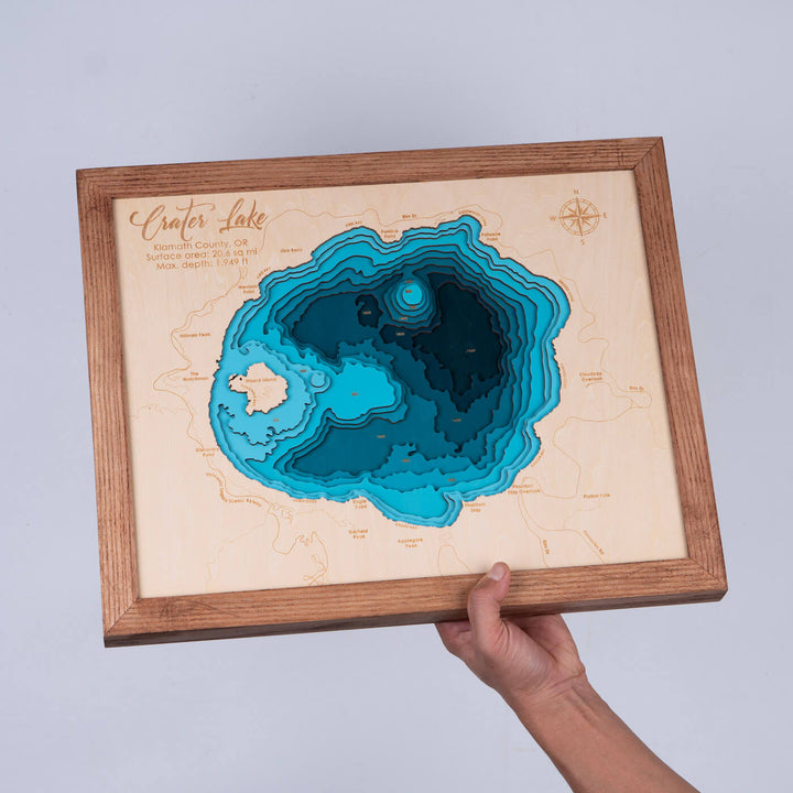 Immerse in the topographical beauty of the Crater Lake 3D wooden map, a unique home decor piece by Moc Tho