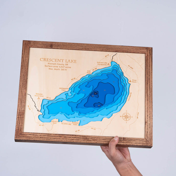 Admire the detailed topography and water depths of the Crescent Lake 3D wooden map, a handcrafted masterpiece by Moc Tho